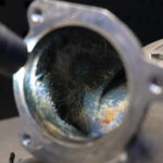 a pipe being inspected for carbon build up