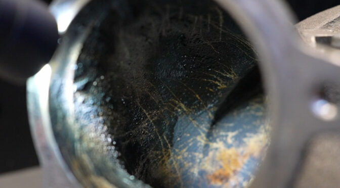 a pipe being inspected for carbon build up