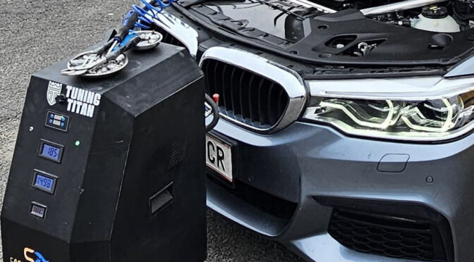 a carbon cleaning machine connected to a vehicles engine