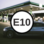E10 in writing over an image of a car in front of a fuel station