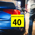 Minimum Cetane Rating 40. A car being filled up at the fuel station.