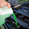 liquid being poured into a coolant system